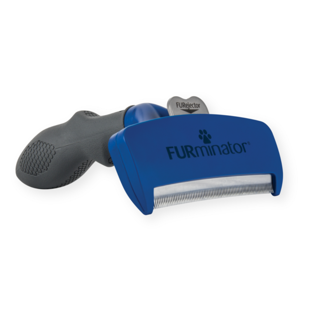 Outil FURminator L poils longs pour chiens de grande taille, vue de côté avec manche ergonomique et lame en acier inoxydable