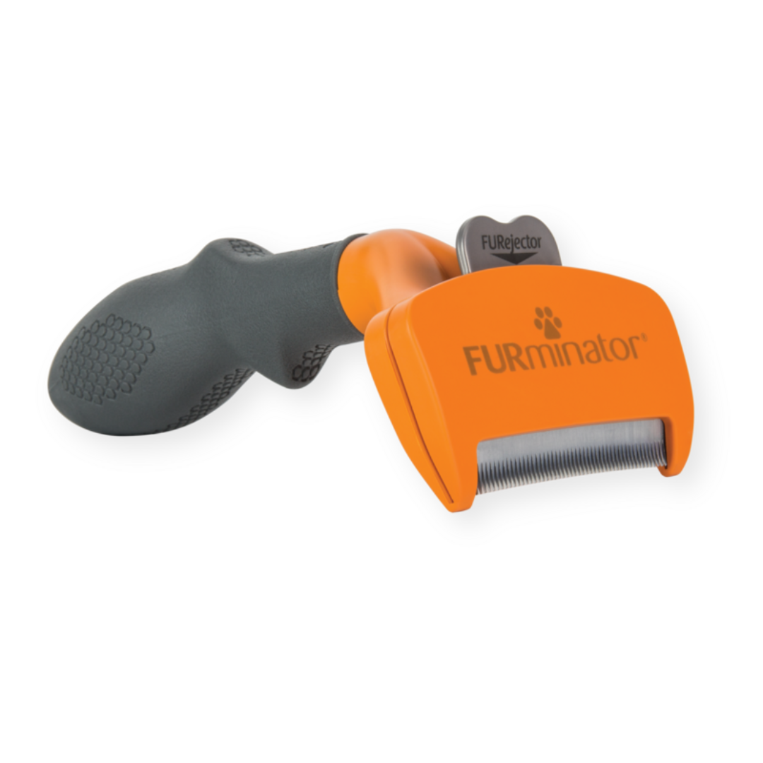 Outil FURminator M poils longs pour chiens de taille moyenne, vue de côté avec manche ergonomique et lame en acier inoxydable