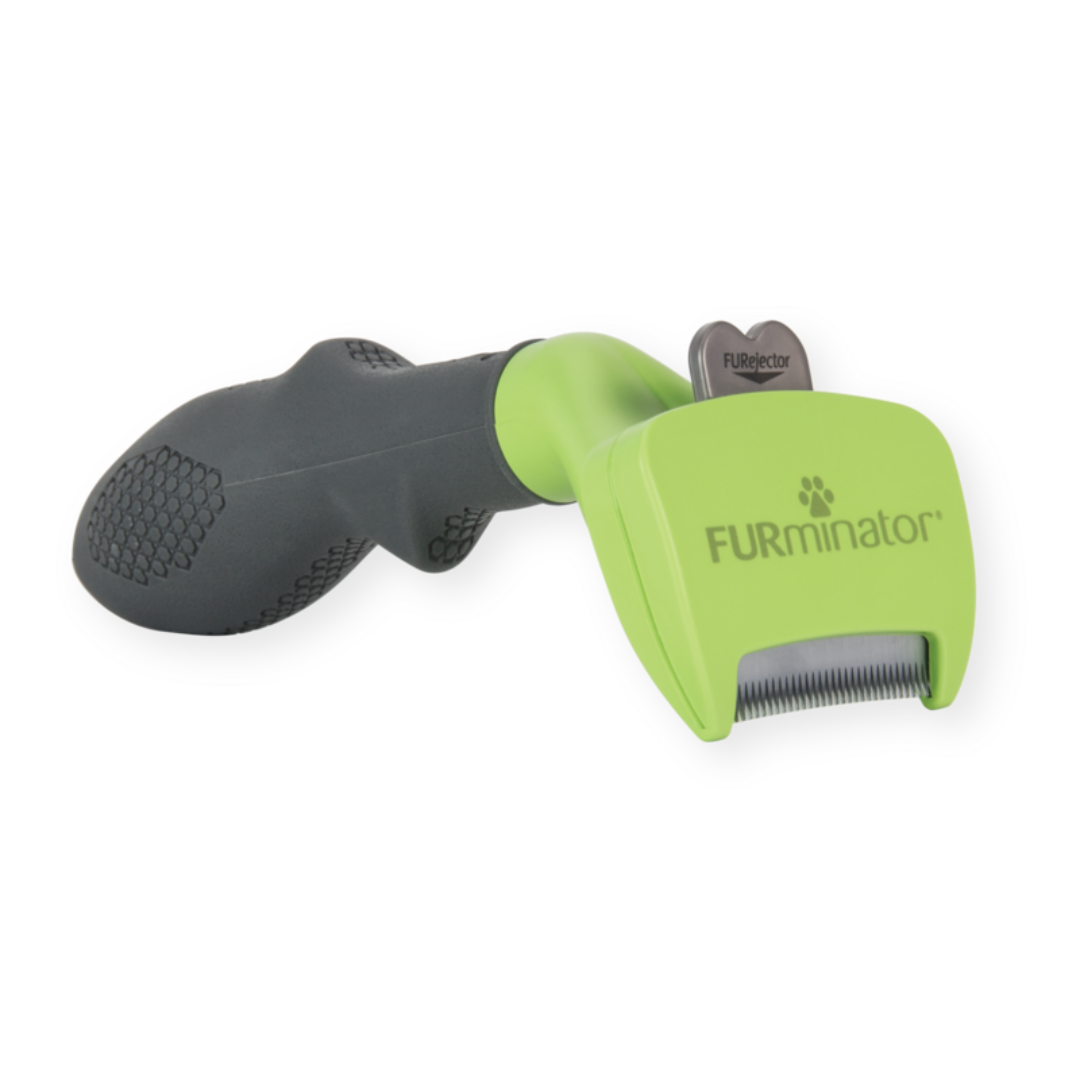Outil FURminator S poils longs pour chiens de petite taille, vue de côté avec manche ergonomique et lame en acier inoxydable