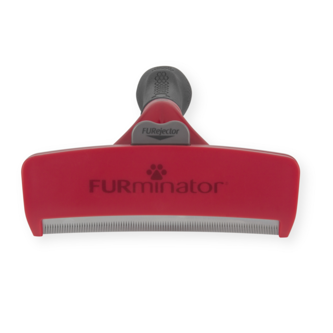 FURminator XL pour chiens à poils longs, vue de face avec bouton FURejector et lame anti-mue visible