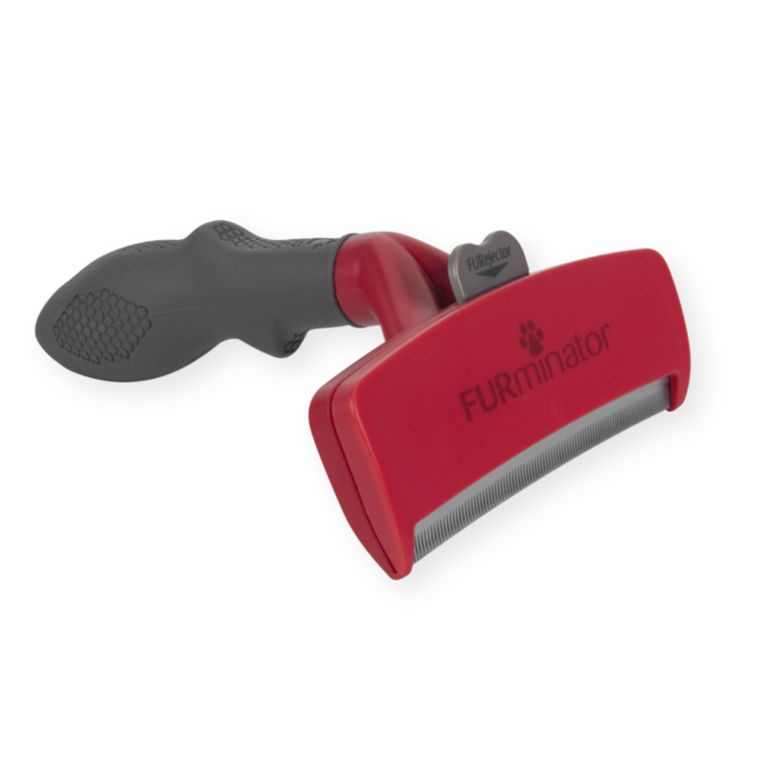 Outil FURminator XL poils longs pour chiens de race géante, vue de côté avec manche ergonomique et lame en acier inoxydable